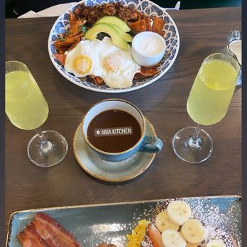 Aria Kitchen - Red sauce chilaquiles - Nutella strawberry and banana stuffed French toast - Mexican Near Me - Irvine, California