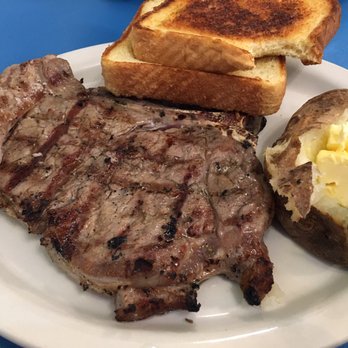 Best Steak House - T-bone steak, medium well-done. Comes with a baked potato, buttered toast and salad. - Steakhouses Near Me - Saint Paul, Minnesota Best Steak House - T-bone steak, medium well-done. Comes with a baked potato, buttered toast and salad. - Steakhouses Near Me - Saint Paul, Minnesota