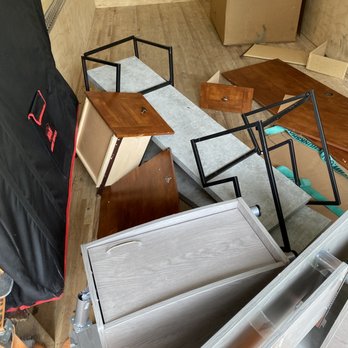 Kane and Family Movers - Broken desks and tv stand (after moving into different truck) - Movers Near Me
