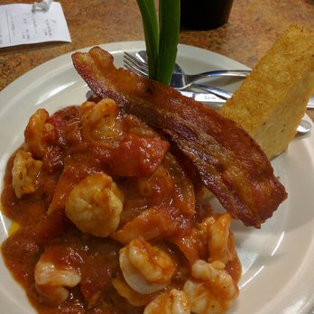 Florida Cracker Kitchen - Shrimp and grits with tomato gravy. - Southern Near Me - Brooksville, Florida Florida Cracker Kitchen - Shrimp and grits with tomato gravy. - Southern Near Me - Brooksville, Florida
