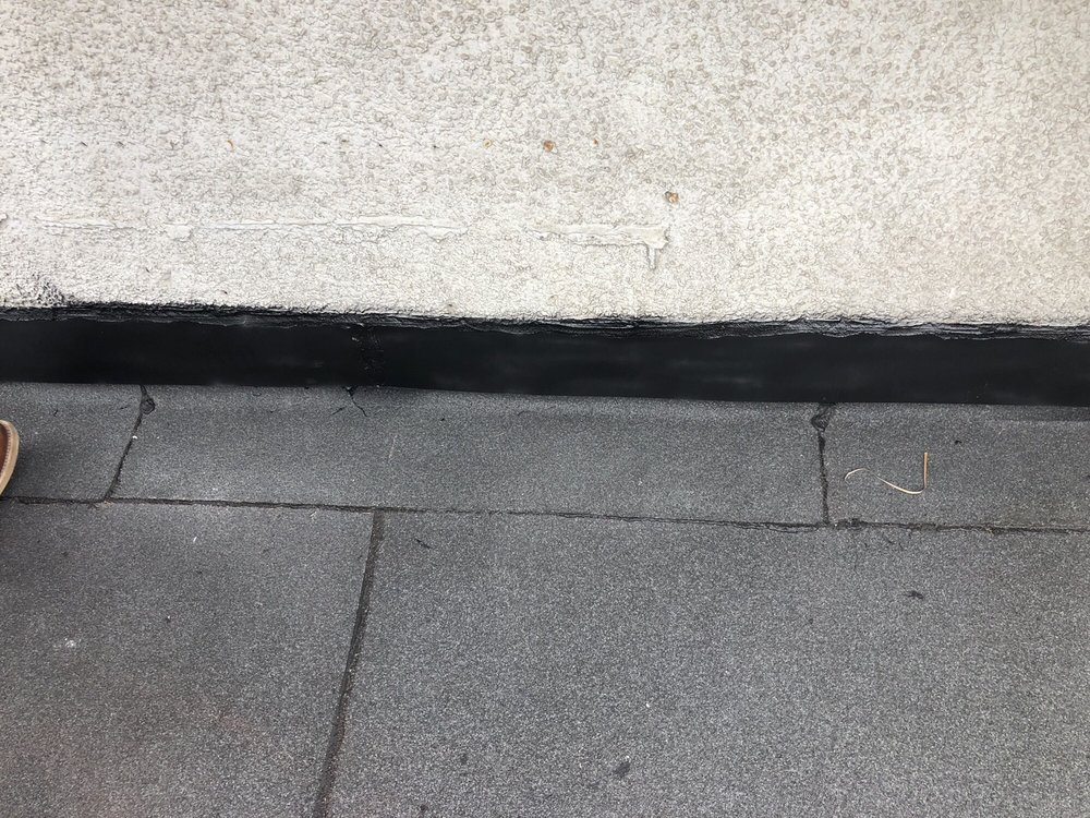 Slide of Kennedy Roofing