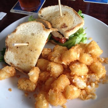 Riley’s on 2nd - Delicious grilled Cajun Chicken Sandwich with tater tots. - New American Near Me - Long Beach, California Riley’s on 2nd - Delicious grilled Cajun Chicken Sandwich with tater tots. - New American Near Me - Long Beach, California