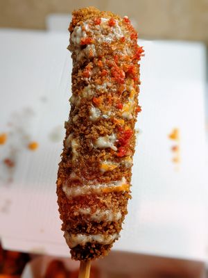 Two Hands Corn Dogs by null
