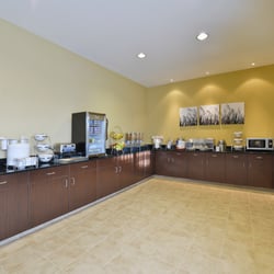 Sleep Inn & Suites Bismarck I-94 - Free full hot breakfast, featuring eggs, bacon, sausage, biscuits and gravy, and waffles.