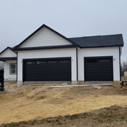 Excellence Garage Doors - Long panel insulated complete door installation