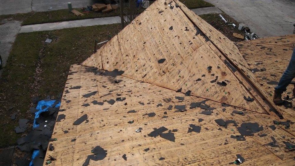 Slide of Trademark Roofing & Construction