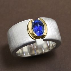 Plante Jewelers - Yellow gold, silver, and blue sapphire make a bold ring!