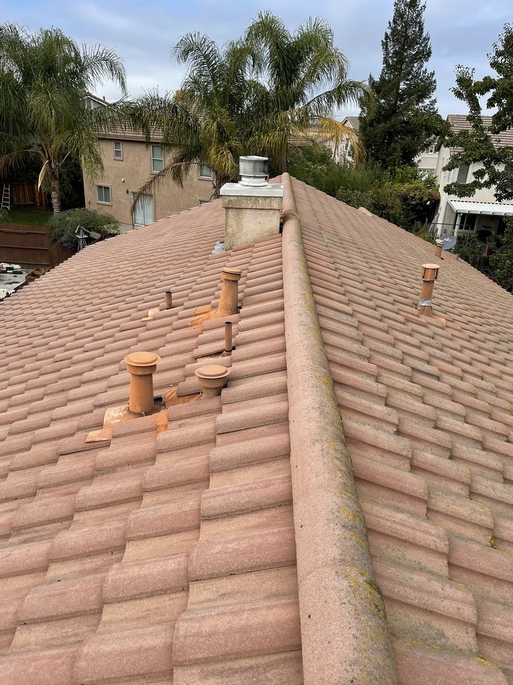 Slide of Maginis Roofing