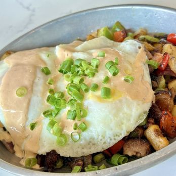 Toasted Gastrobrunch - Smoked Brisket Hash. The brisket and potatoes are both cubed; crispy on the outside and tender on the inside. - Breakfast & Brunch Near Me - Oceanside, California