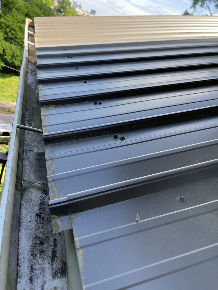 Slide of Marcus Gutters Cleaning