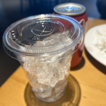 Pho Ngon - a plastic cup with ice in it - Vietnamese Near Me - Norristown, Pennsylvania