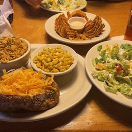 a variety of dishes of food a variety of dishes of food