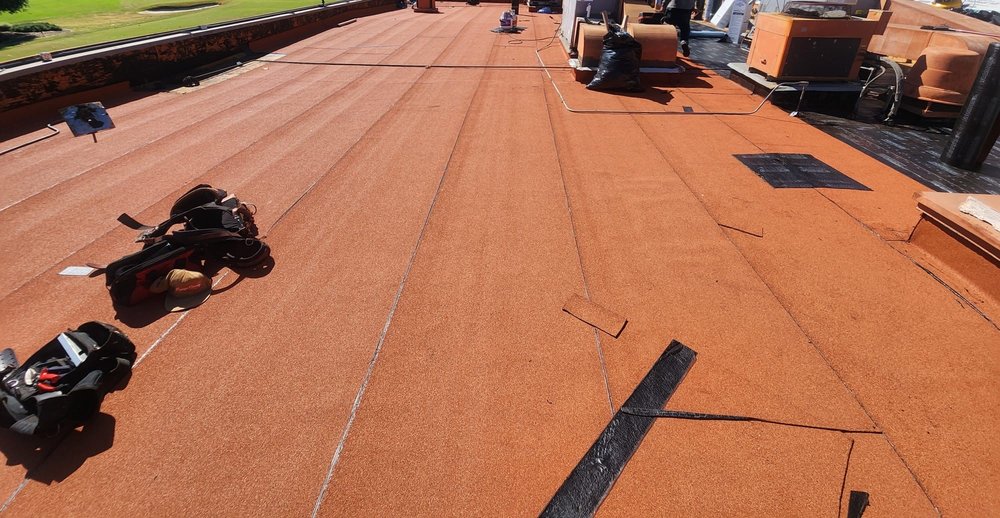 Slide of iHeart Roofing