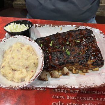 Olde Nola Cookery - Slab of Ribs with a side of mashed potatoes - Cajun/Creole Near Me - New Orleans, Louisiana Olde Nola Cookery - Slab of Ribs with a side of mashed potatoes - Cajun/Creole Near Me - New Orleans, Louisiana