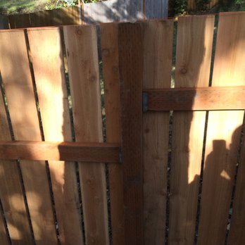 Racy's - The top rail on the left is installed so low, for absolutely no reason, the pickets above the rail can easily snap off. - Handyman Near Me - Burien, Washington Racy's - The top rail on the left is installed so low, for absolutely no reason, the pickets above the rail can easily snap off. - Handyman Near Me - Burien, Washington