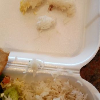 Rice Mediterranean Kitchen - Clumps of Rice and dried reheated chicken - Middle Eastern Near Me - North Miami, Florida Rice Mediterranean Kitchen - Clumps of Rice and dried reheated chicken - Middle Eastern Near Me - North Miami, Florida