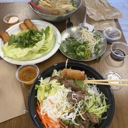 Vermicelli bowl with grilled pork, chicken pho, egg rolls Vermicelli bowl with grilled pork, chicken pho, egg rolls