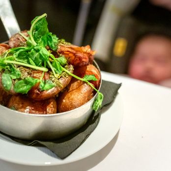 Montrio - Side Smashed & Duck Fat Fried Yukon Golds with Chermoula $16 - New American Near Me - Monterey, California