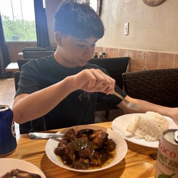 Manila Eats - Someone ready to tear inti some lola's chicken. 05.06.2025 - Filipino Near Me - Tampa, Florida Manila Eats - Someone ready to tear inti some lola's chicken. 05.06.2025 - Filipino Near Me - Tampa, Florida