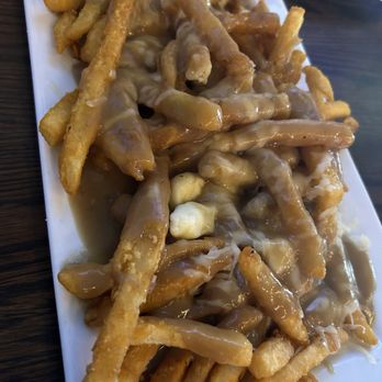 The Canadian Brewhouse - Classic poutine - Sports Bars Near Me - Banff, Alberta The Canadian Brewhouse - Classic poutine - Sports Bars Near Me - Banff, Alberta