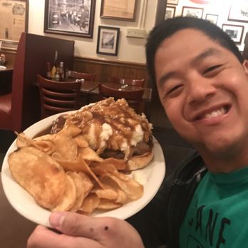 Crystal Beer Parlor - Shows the comparison of the burger to a persons head! - Southern Near Me - Savannah, Georgia