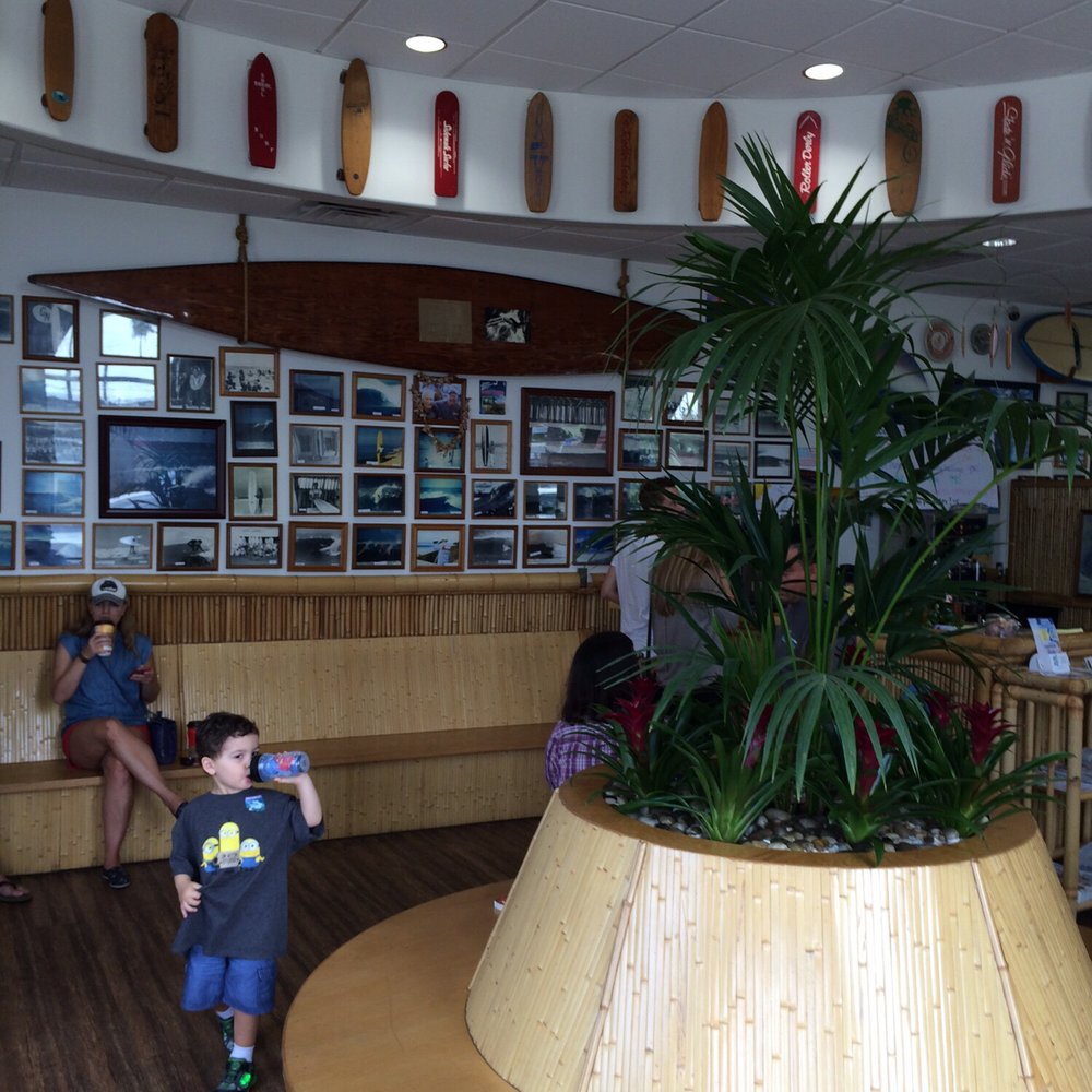Beach Break Cafe - Another shot of that waiting area. My son enjoyed his juice while being entranced by that center bench. - Breakfast & Brunch Near Me - Oceanside, California Beach Break Cafe - Another shot of that waiting area. My son enjoyed his juice while being entranced by that center bench. - Breakfast & Brunch Near Me - Oceanside, California