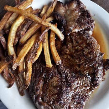 Doe's Eat Place - Lunch Ribeye Plate. One pound ribeye with huge serving of fries. - Steakhouses Near Me - Paducah, Kentucky Doe's Eat Place - Lunch Ribeye Plate. One pound ribeye with huge serving of fries. - Steakhouses Near Me - Paducah, Kentucky