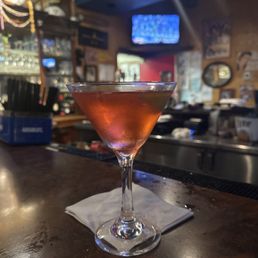 a cocktail sitting on a bar