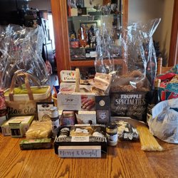 Homegoods - Great clearance deals on xmas basket sets -  I disassembled them to create my own versions for themed wine baskets