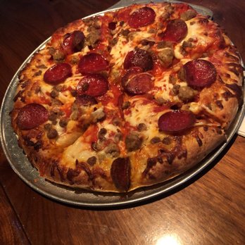 The Cellar Bar - Three Meat Pizza - Dive Bars Near Me - Houston, Texas