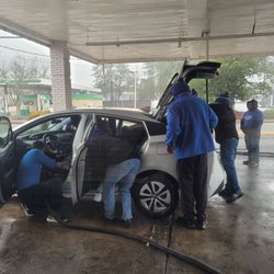 Mikael's Auto Spa - The whole crew cleaning my car! Impressive!
