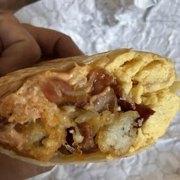 Breakfast Burrito. (First bite) Breakfast Burrito. (First bite)