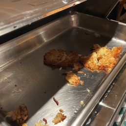 The potato pancakes were being replenished often. The potato pancakes were being replenished often.