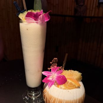 Adrift Tiki Bar - Left is the frozen chi chi - right is the painkiller - Tiki Bars Near Me - Denver, Colorado Adrift Tiki Bar - Left is the frozen chi chi - right is the painkiller - Tiki Bars Near Me - Denver, Colorado