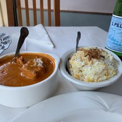 Poppodom - Chicken tikka masala and rice pilaf