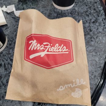 Mrs. Fields McCarran Airport - a paper bag on a table - Bakeries Near Me - Las Vegas, Nevada