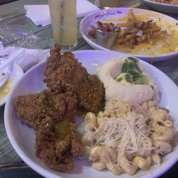 Lost & Found - Lemon Pepper Fried Chicken  mashed potatoes and Mac & Cheese with loaded fries appetizer - Cocktail Bars Near Me - Houston, Texas