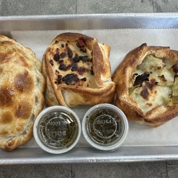 Empanada Factory - Left to right: Beef (baked), Caprese (baked), and artichoke (baked) - Empanadas Near Me - Cypress, Texas Empanada Factory - Left to right: Beef (baked), Caprese (baked), and artichoke (baked) - Empanadas Near Me - Cypress, Texas