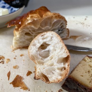 Fournée Bakery - X-sections of flaky chocolate croissant & baguette, and custardy canele. - Bakeries Near Me - Berkeley, California Fournée Bakery - X-sections of flaky chocolate croissant & baguette, and custardy canele. - Bakeries Near Me - Berkeley, California