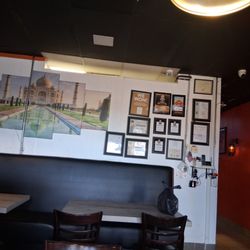 Its Taste Of India - The restaurant wall of awards. This is just part of them. This speaks volumes.