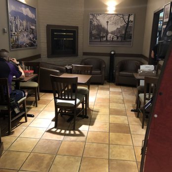 Second Cup - people sitting at tables in a restaurant - Coffee & Tea Near Me - Mississauga, Ontario