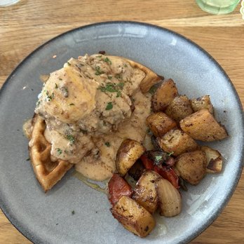 Lucy's - Chicken and waffle Benny with gravy - New American Near Me - Auburn, Alabama