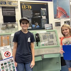 Sands Space History Center - Showing grandsons what a real life telephone looks like even in space consoles
