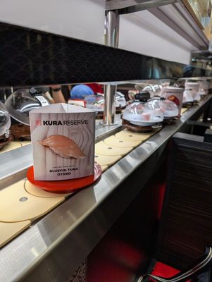 Kura Revolving Sushi Bar by null