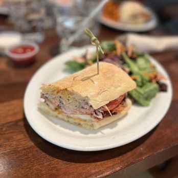 Old Ship Saloon - a plate with a sandwich and salad - Pubs Near Me - San Francisco, California Old Ship Saloon - a plate with a sandwich and salad - Pubs Near Me - San Francisco, California