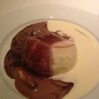 The Iron Gate - Soufflé with half grand marnier sauce and half chocolate sauce. - French Near Me - Belmont, California