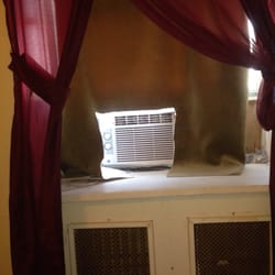 The George Washington - Beautiful curtains & a creative way to allow for the air to blow through without rolling them up!