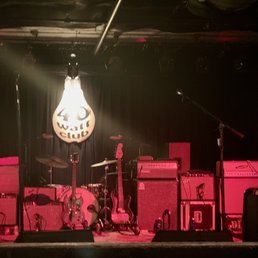 a stage with red lighting a stage with red lighting