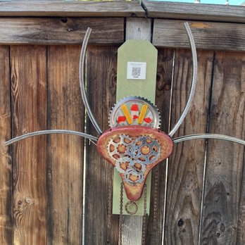 Sinor-LaVallee - a clock on a fence - Wine Tasting Room Near Me - Avila Beach, California