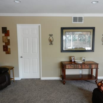 Wright's Labor Service - a man standing in a living room - General Contractors Near Me - Cypress, California Wright's Labor Service - a man standing in a living room - General Contractors Near Me - Cypress, California